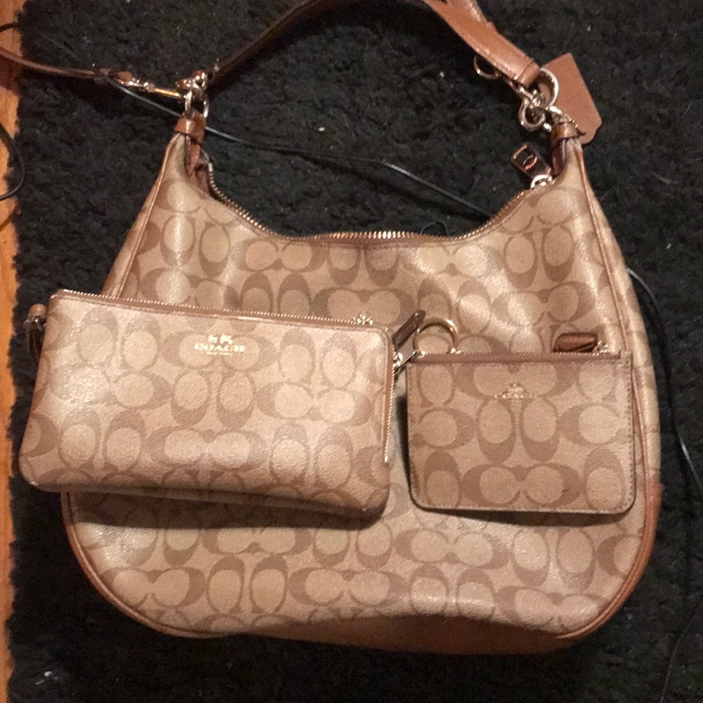Coach purse and 2 wallets